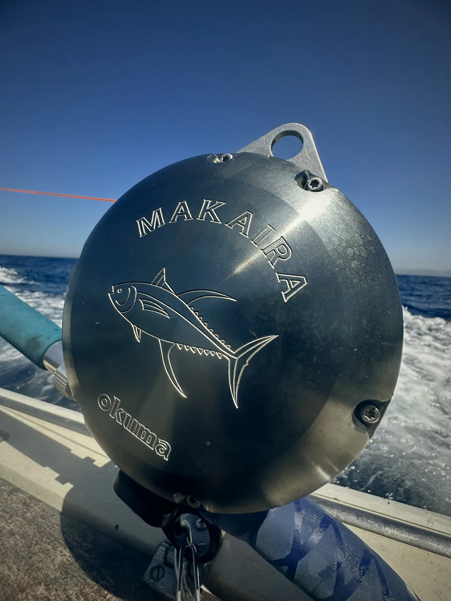 Okuma Makaira reel engraved with bluefin tuna